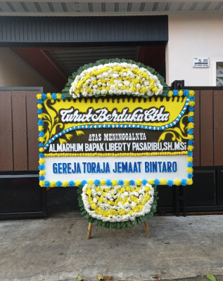 Papan Bunga Duka di Drono